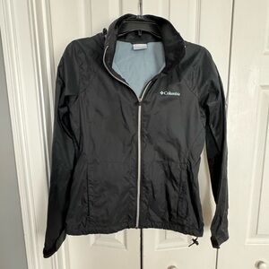 Columbia Women’s raincoat black with teal emblem size Small